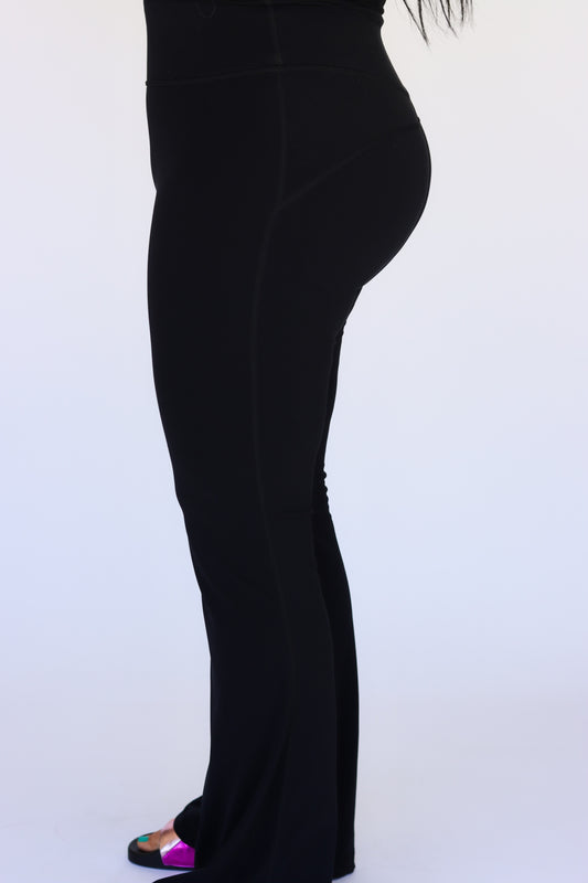 Experience the ultimate in comfort and style with our black butter-soft yoga pants. Designed to enhance your booty, these leggings offer a flattering fit that hugs your curves in all the right places. Made from luxuriously soft fabric, they provide unmatched comfort for both workouts and everyday wear. Elevate your activewear collection with these must-have yoga pants.

