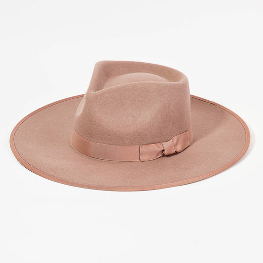Introducing the Ribbon Strap Flat Brim Fedora Hat - a stylish yet practical accessory for any fashion-forward individual. Crafted with a stylish ribbon and a flat brim, this fedora hat is perfect for adding a touch of sophistication to any outfit. Stay effortlessly chic with this must-have accessory.