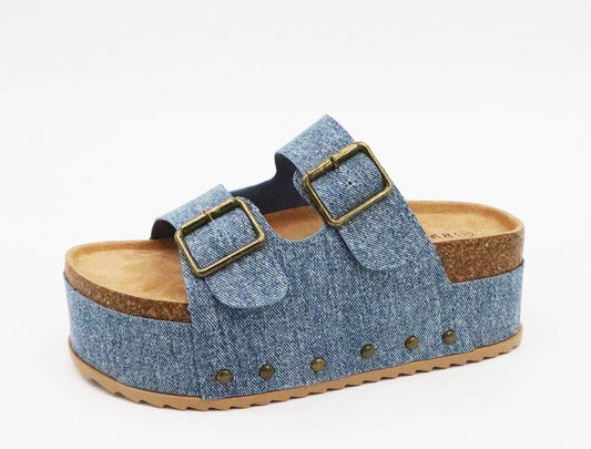 Introducing the Blue Denim Better than Birkies. With its blue denim material and platform design, this shoe provides both style and height. Expertly crafted for maximum comfort and support, take your outfit to the next level with this versatile shoe.