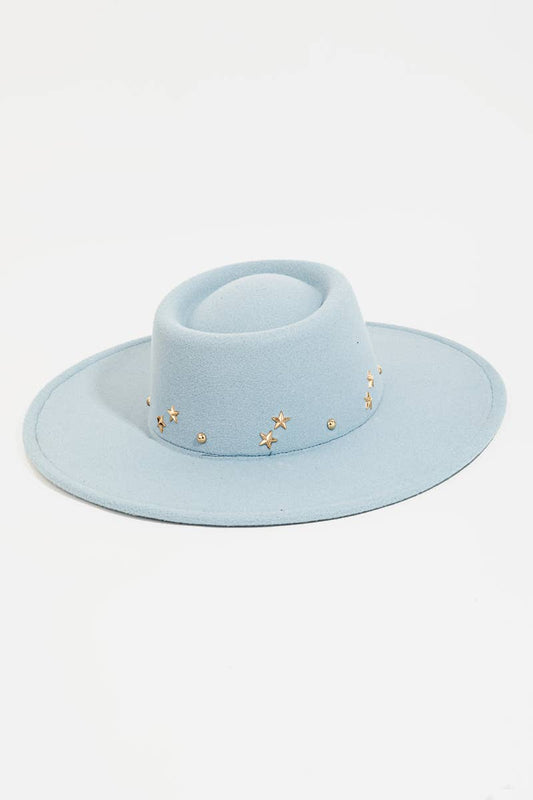 Introducing the Star Studded Fedora Hat, featuring a stylish blue color and accented with stars. Expertly crafted to fit most head sizes, this fedora is the perfect fashion statement for any occasion. Make a statement with this unique and versatile hat.